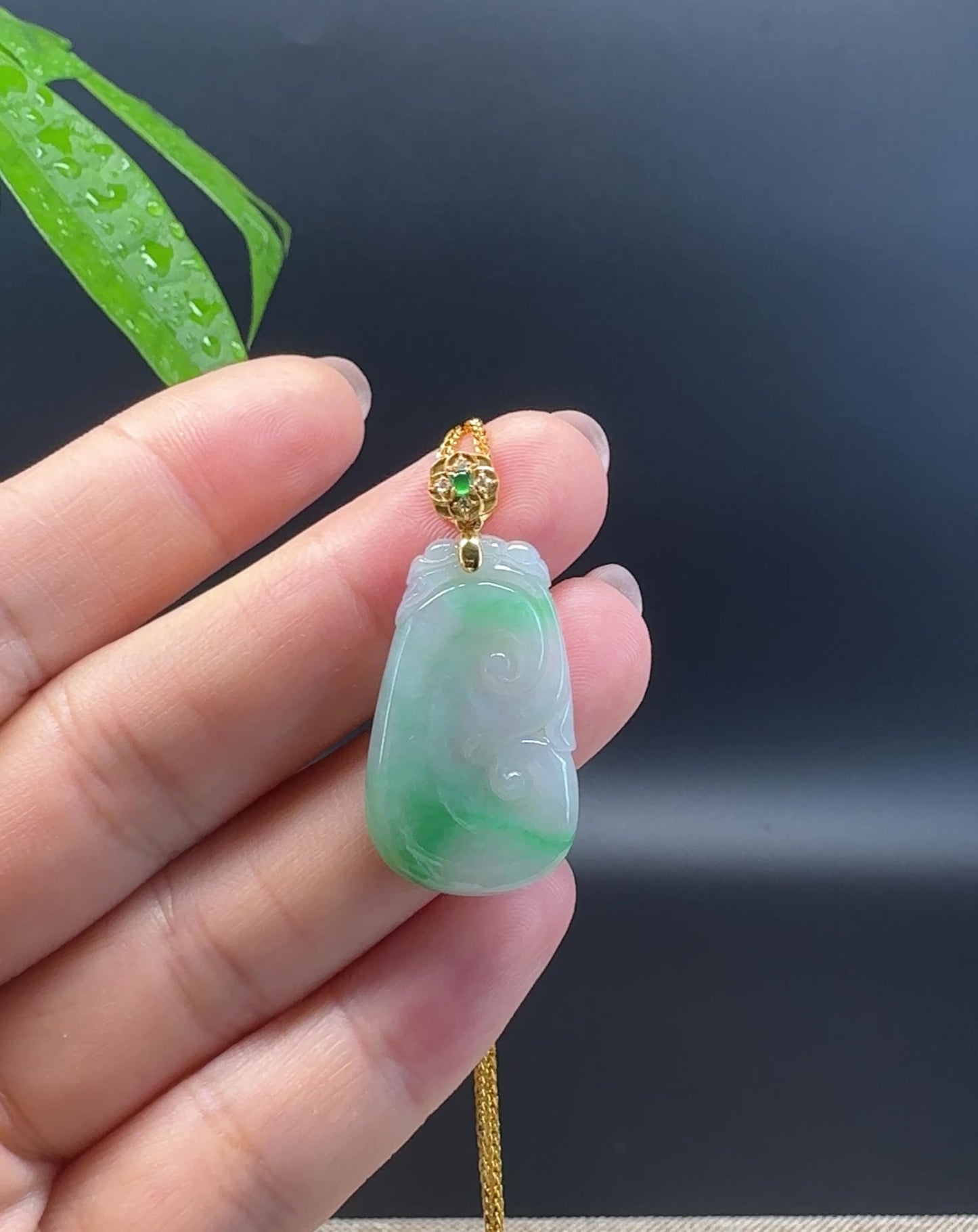 Load and play video in Gallery viewer, RealJade® Co. Genuine Icy Green Jadeite Jade Good Luck RuYi Necklace With 18K Yellow Gold Bail
