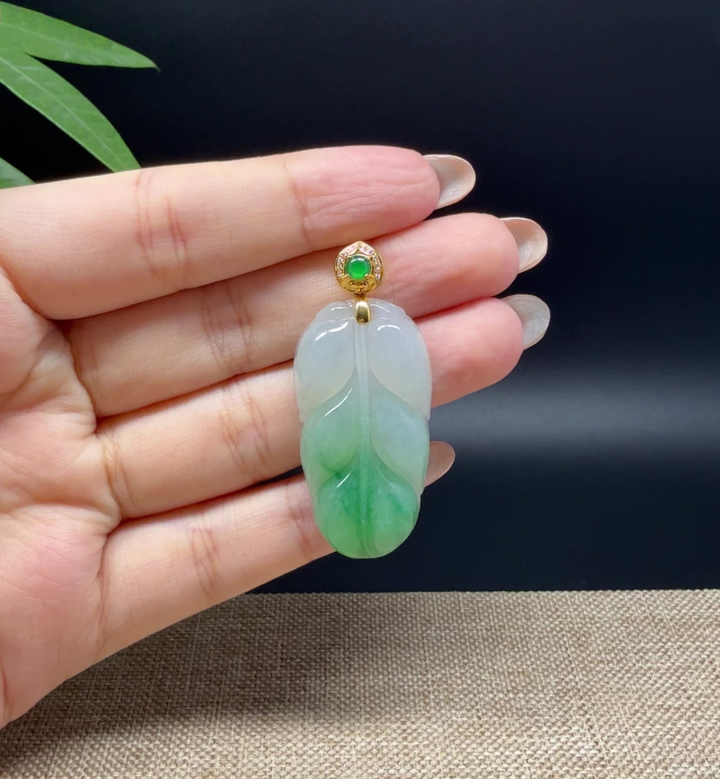 Load and play video in Gallery viewer, RealJade® Co. Genuine Ice Green Jadeite Jade Jin Zhi Yu Ye (Leaf) Necklace With 18K Yellow Gold Bail
