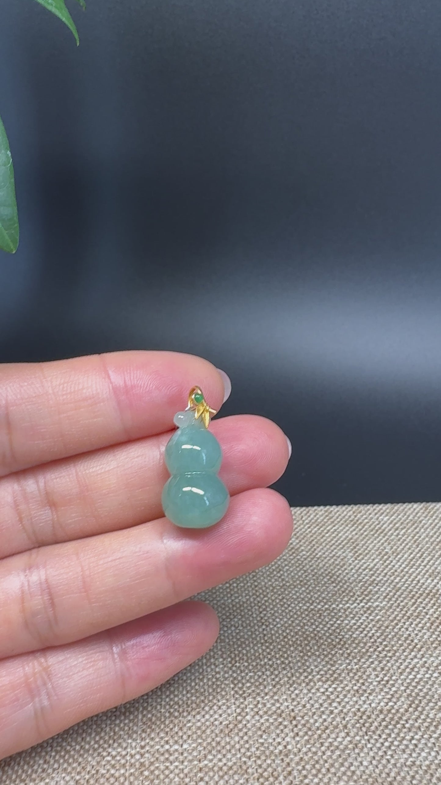 Load and play video in Gallery viewer, RealJade® Co. Genuine Green Jadeite Jade Good Luck Hulu Bottle Gourd Necklace With 18K Yellow Gold Bail
