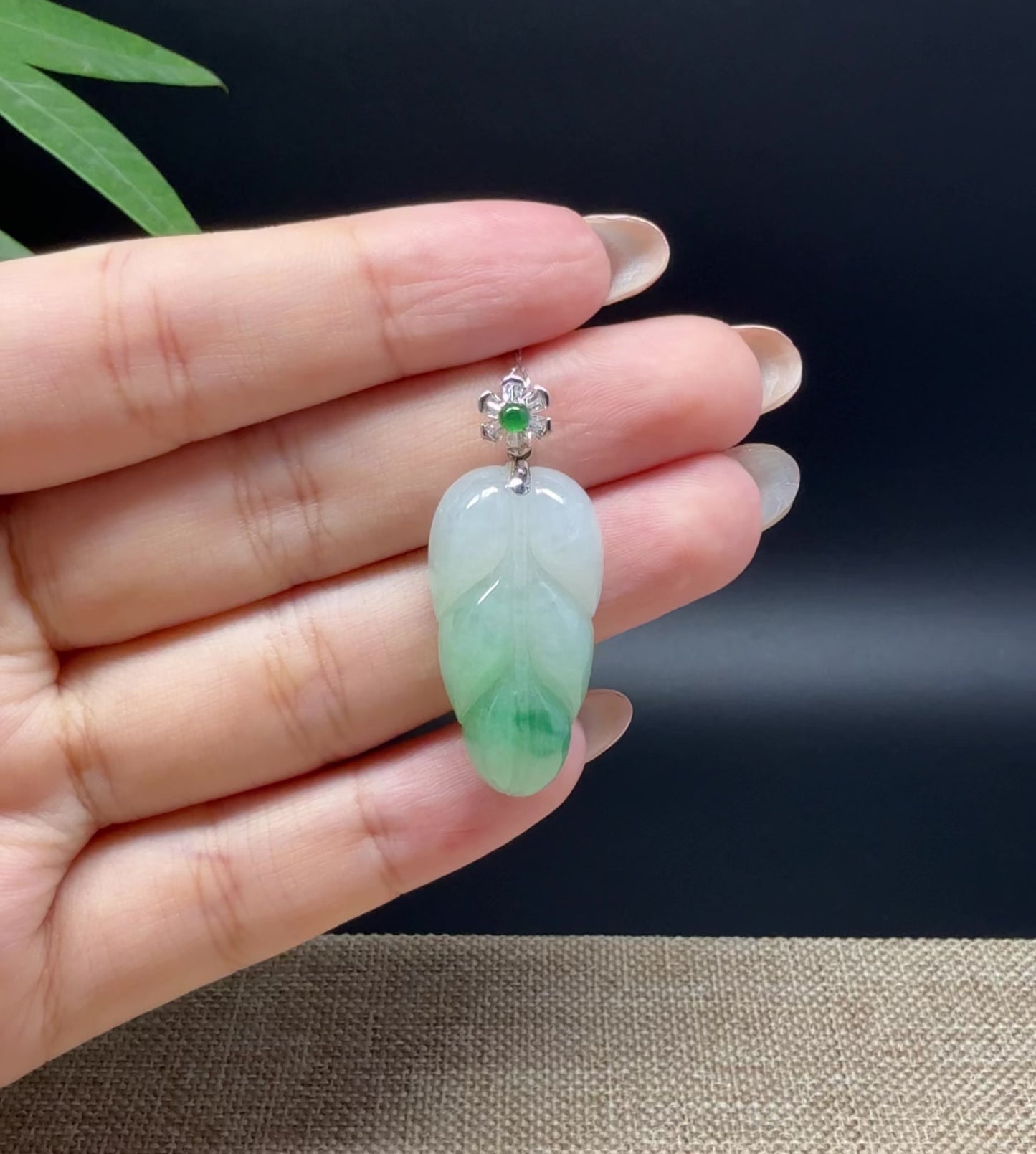 Load and play video in Gallery viewer, RealJade® Co. Genuine Ice Green Jadeite Jade Jin Zhi Yu Ye (Leaf) Necklace With 18K White Gold Bail
